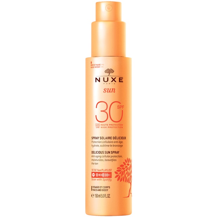 Nuxe Sun SPF 30 Delicious Sun Spray 150 ml beskyttende solspray som gir fuktighet i en oransje flaske med pumpe.