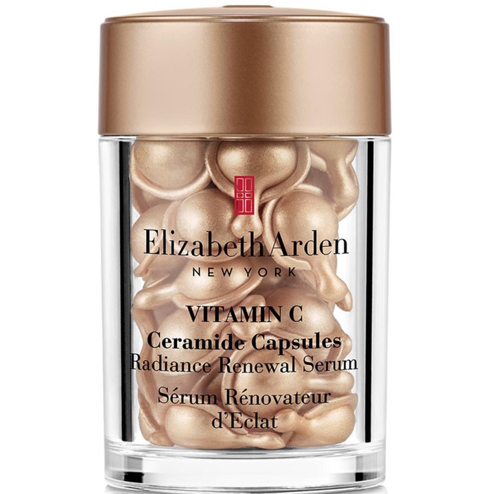 Elizabeth Arden Vitamin C Ceramide Capsules ansiktsserum i klar krukke med gylne kapsler som gir huden fornyet glød.