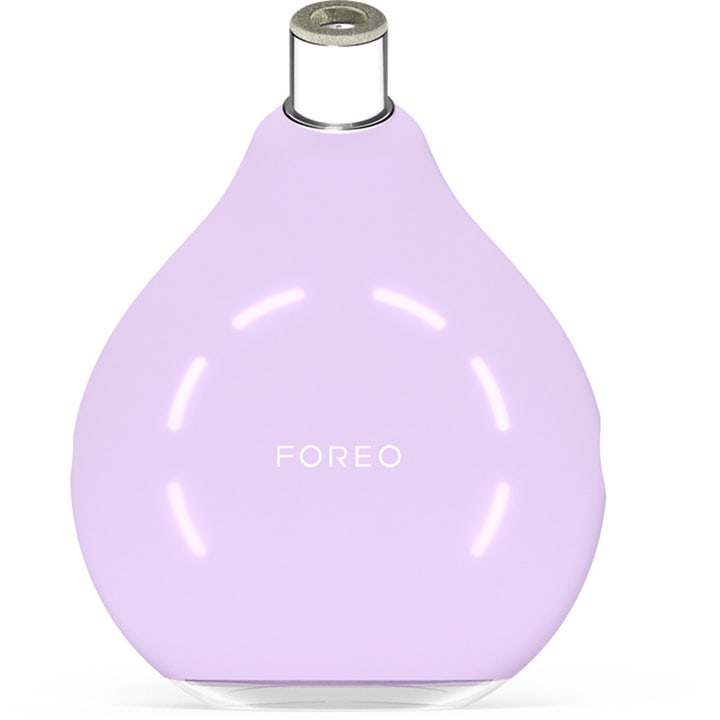 FOREO KIWI derma 1 stk mikrodermabrasjon som gir glød i en lys lilla pæreformet enhet med sølvtupp og lysring