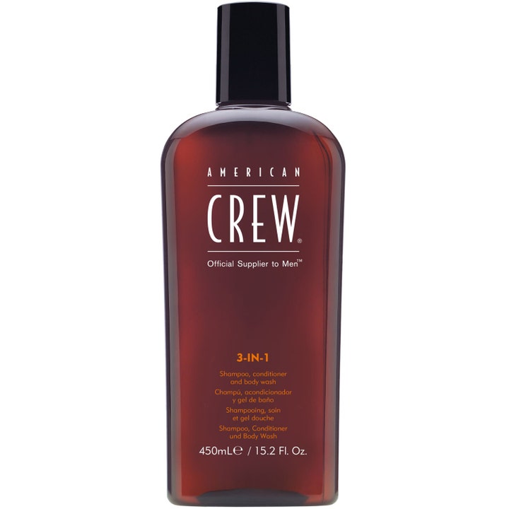 American Crew 3-IN-1 450ml pleiende sjampo og kroppsvask i en mørkebrun gjennomsiktig flaske med sort kork