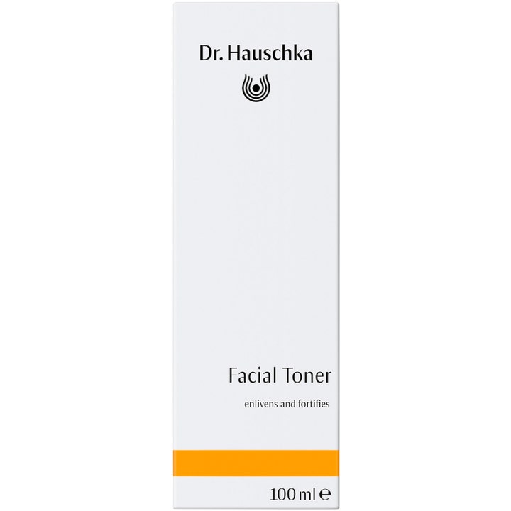 Dr. Hauschka Facial Toner 100 ml oppfriskende ansiktsvann i hvit pappkartong med en oransje stripe nederst.