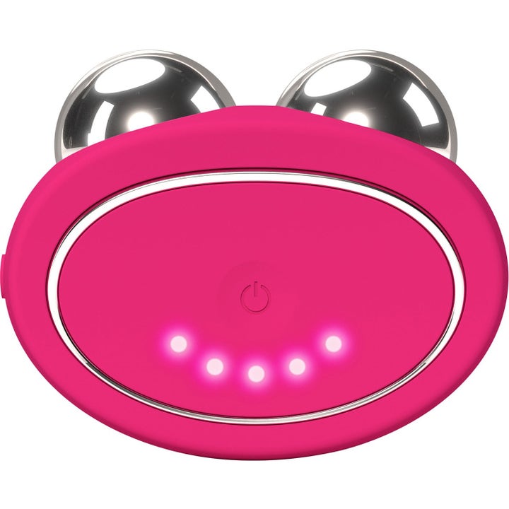 FOREO BEAR 2 Fuchsia oppstrammende mikrostrømenhet for ansiktet i rosa silikon med to sølvfargede metallkuler