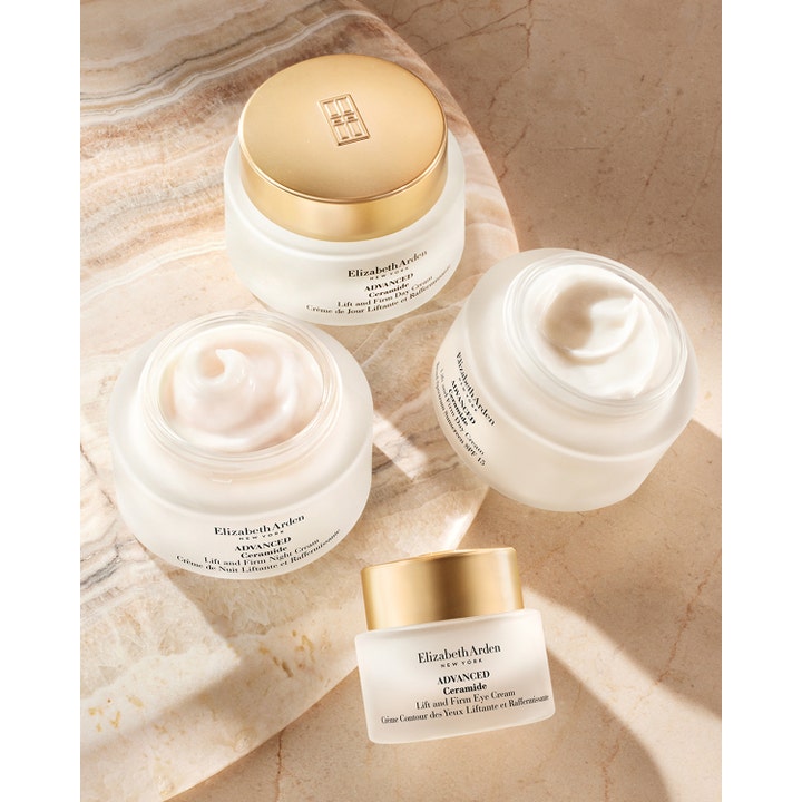 Elizabeth Arden Ceramide Lift & Firm Advanced Eye Cream 15 ml øyekrem i hvit krukke med gulllokk på marmorflate