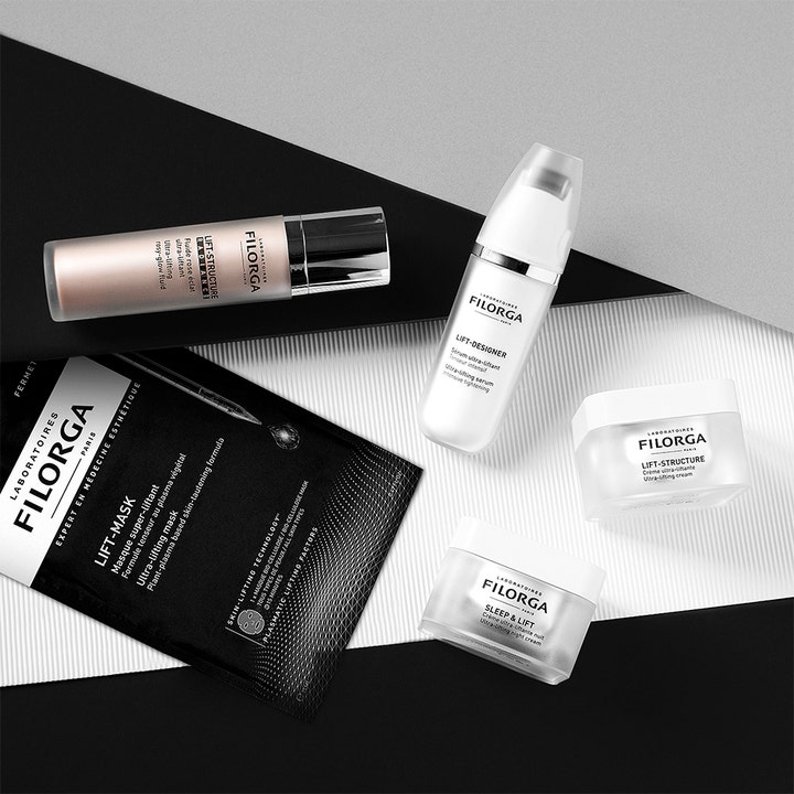 Filorga Lift-Structure 50 ml oppstrammende ansiktskrem i hvit krukke vist med serum og maske i samme serie