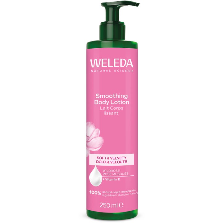 Weleda Smoothing Body Lotion 250 ml utglattende kroppslotion med villrose i grønn flaske med rosa etikett og pumpe