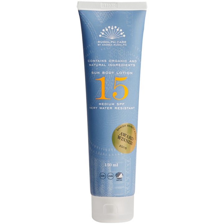 Rudolph Care Sun Body Lotion SPF 15 150 ml vannavstøtende solkrem i lyseblå tube med hvit kork og stort oransje tall