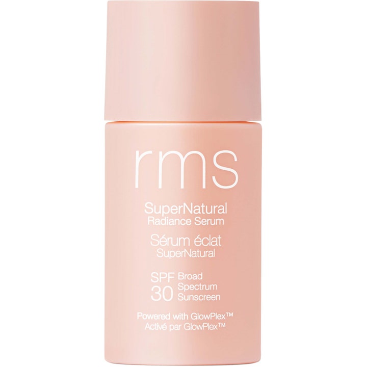 RMS SuperNatural Radiance Serum SPF 30 glødgivende solbeskyttelse i en ferskenfarget sylindrisk flaske