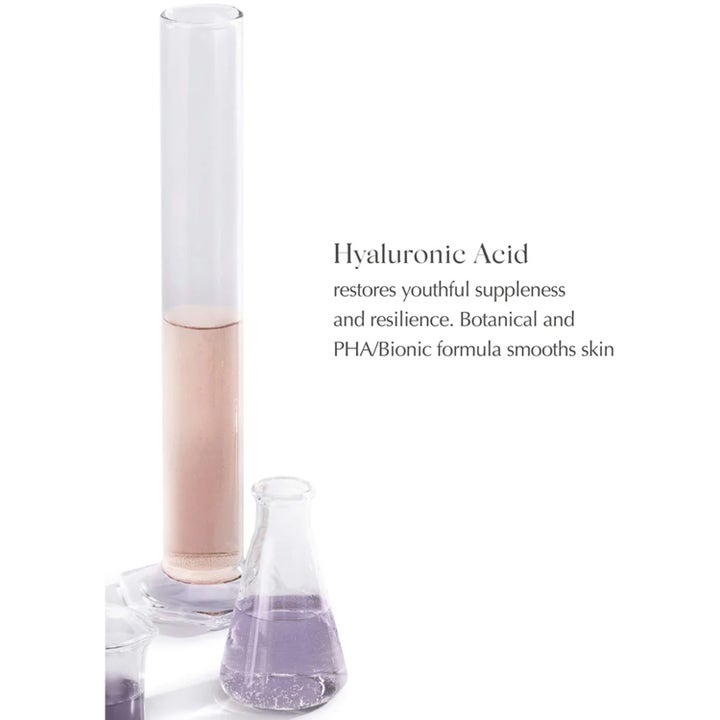 Exuviance HydraSoothe Refresh Toner 200 ml med fuktighetsgivende hyaluronsyre og PHA i laboratorieglass.