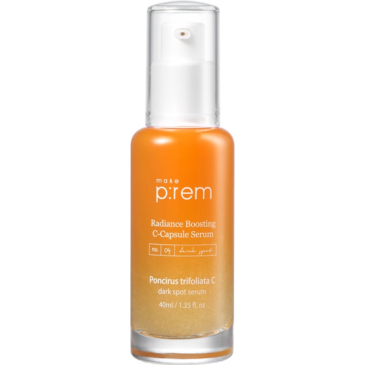 Make P:rem Radiance Boosting C-Capsule Serum 40ml mot mørke flekker i en klar pumpeflaske med oransje vitaminkapsler