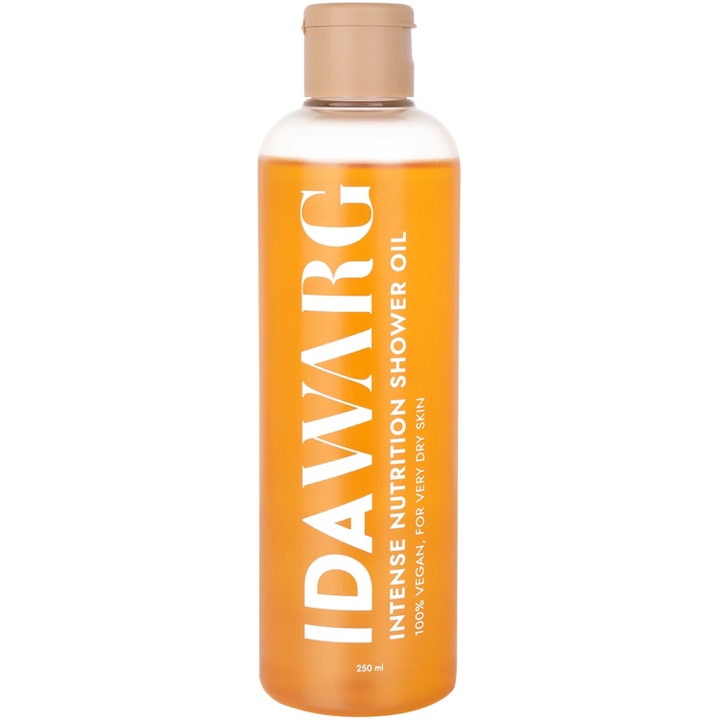 Ida Warg Intense Nutrition Shower Oil 250 ml pleiende dusjolje i gjennomsiktig plastflaske med oransje innhold