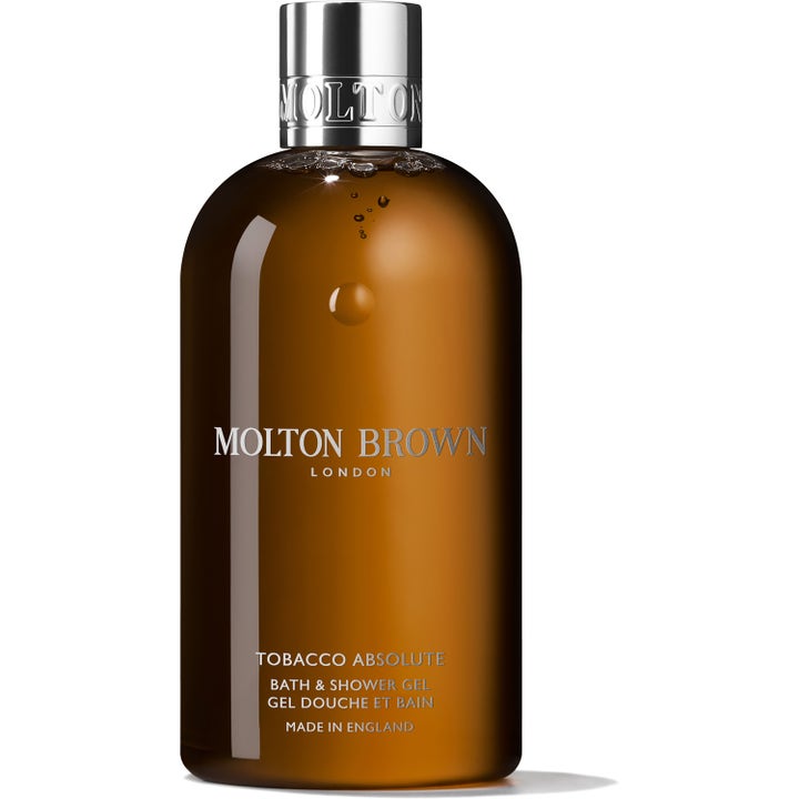 Molton Brown Tobacco Absolute 300ml rengjørende dusjsåpe i gjennomsiktig brun flaske med elegant sølvkork.