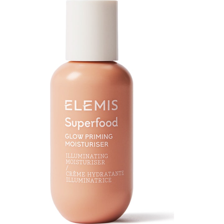 Elemis Superfood Glow Priming Moisturiser 60 ml glødgivende ansiktskrem i ferskenfarget flaske med hvitt skrulokk.