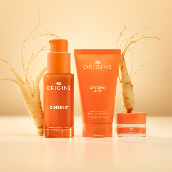 Origins GinZing Into the Glow Brightening Serum 30 ml opplysende serum i oransje flaske med ginsengrøtter