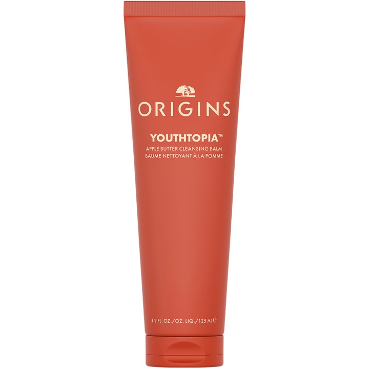 Origins Youthtopia Apple Butter Cleansing Balm 125 ml rengjørende ansiktsrens i en matt rødbrun tube med hvit tekst.