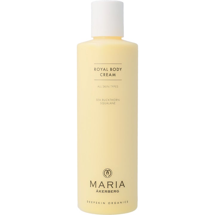 Maria Åkerberg Royal Body Cream fuktighetskrem mot tørr hud i en frostet lys gul plastflaske med hvit kork
