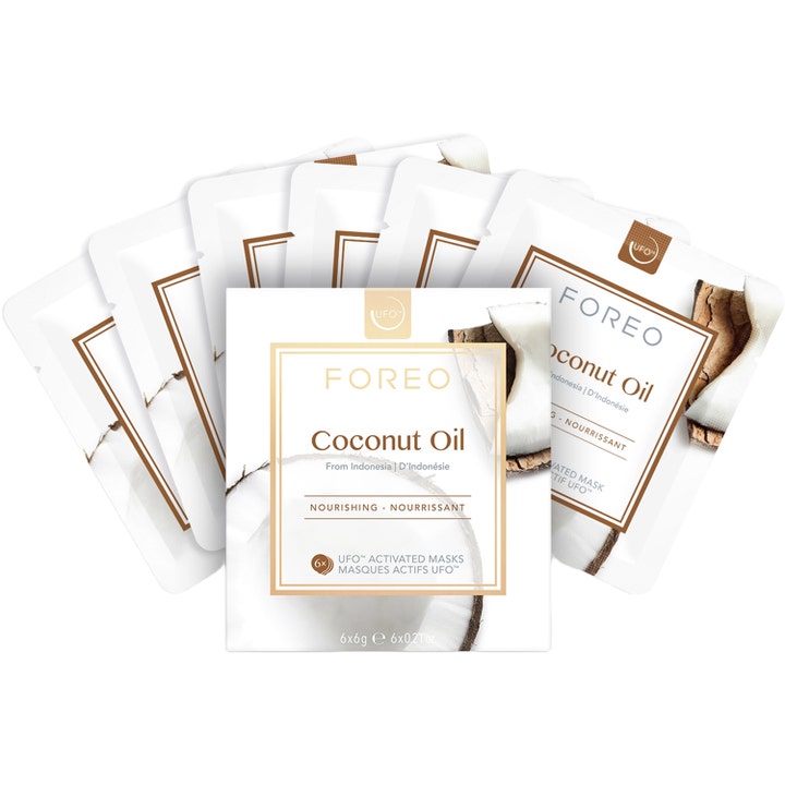 FOREO UFO Mask Coconut Oil 36 g pleiende ansiktsmaske i seks hvite porsjonsposer med bilde av fersk kokosnøtt.
