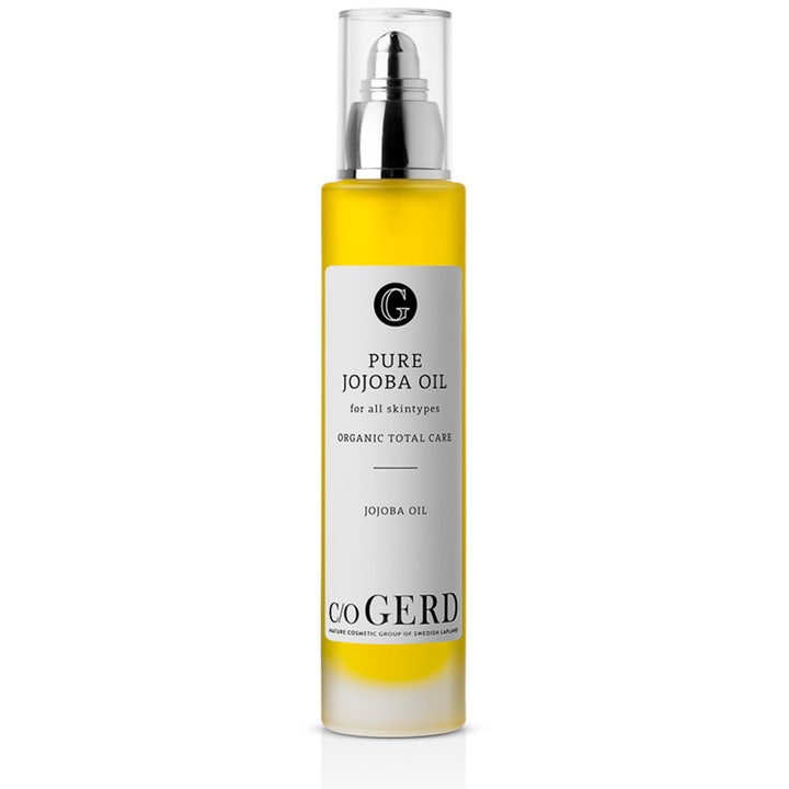 c/o Gerd Pure Jojoba Oil pleiende ansiktsolje som gir fukt i en slank flaske med klar gul olje og sølvpumpe