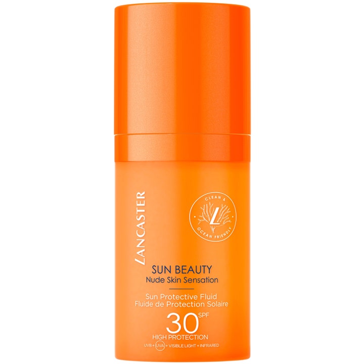 Lancaster Sun Beauty Nude Skin Sensation SPF 30 solkrem gir høy solbeskyttelse i en oransje sylindrisk flaske