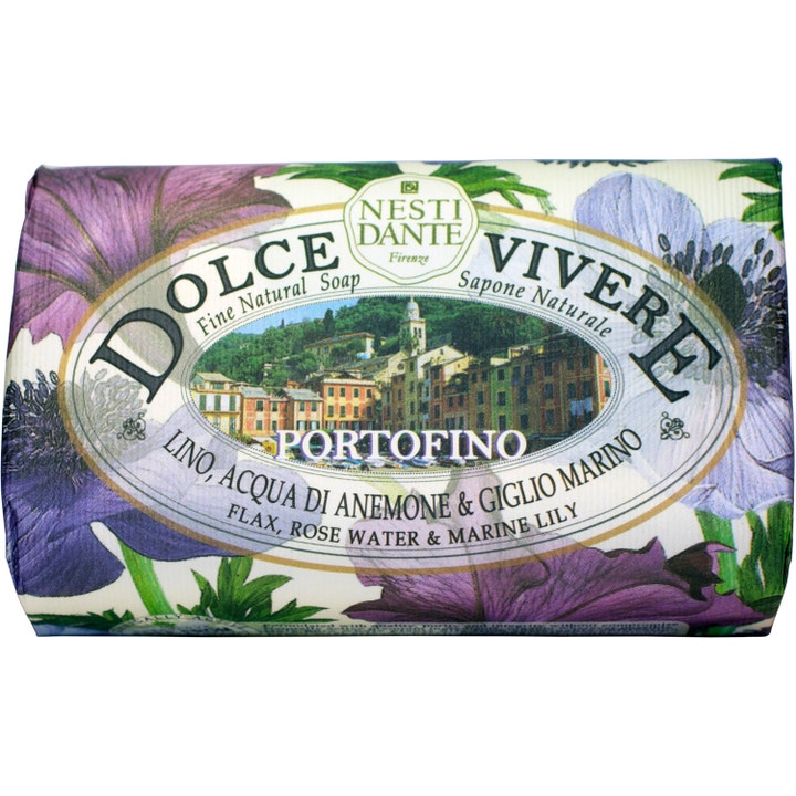 Nesti Dante Dolce Vivere Portofino 250g pleiende natursåpe i papir med lilla blomster og dekorativ kystlandsby.