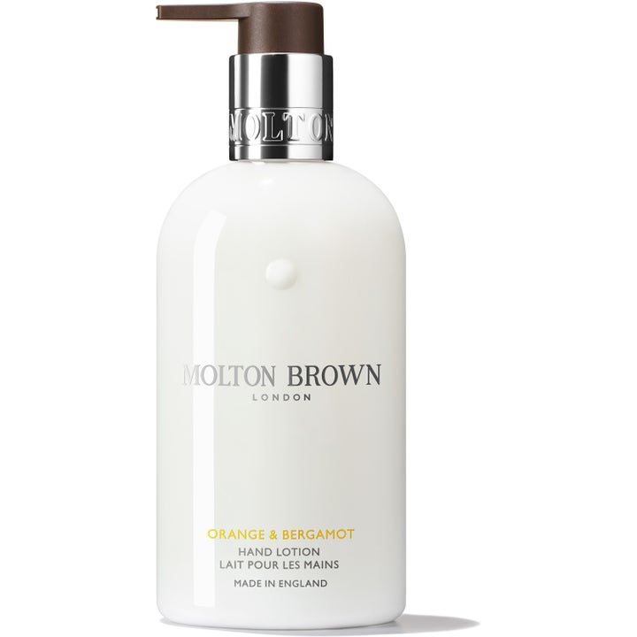 Molton Brown Orange & Bergamot Hand Lotion 300 ml fuktighetsgivende håndkrem i hvit pumpeflaske med sølvdetaljer