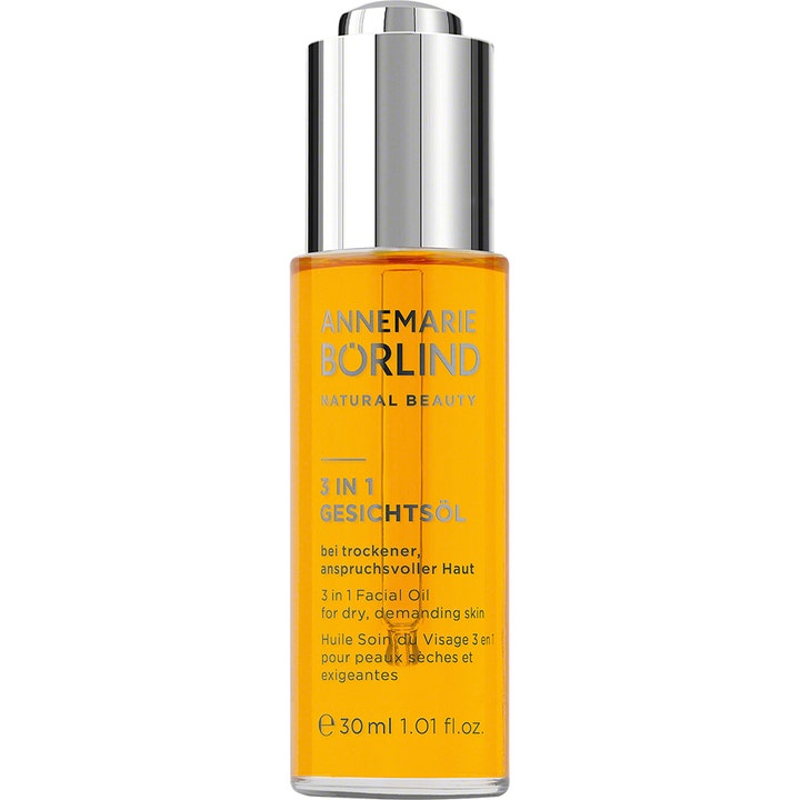 Annemarie Börlind 3 in 1 Facial Oil 30 ml fuktighetsgivende ansiktsolje i glassflaske med oransje nyanse og sølvkork