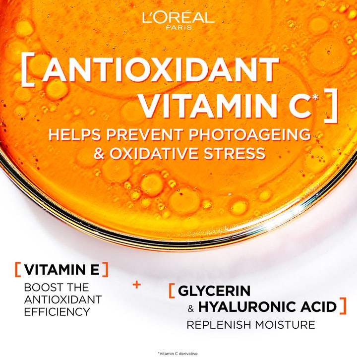 L'Oréal Paris Revitalift Clinical 50 ml solkrem med Vitamin C og hyaluronsyre i en gyllen flytende tekstur