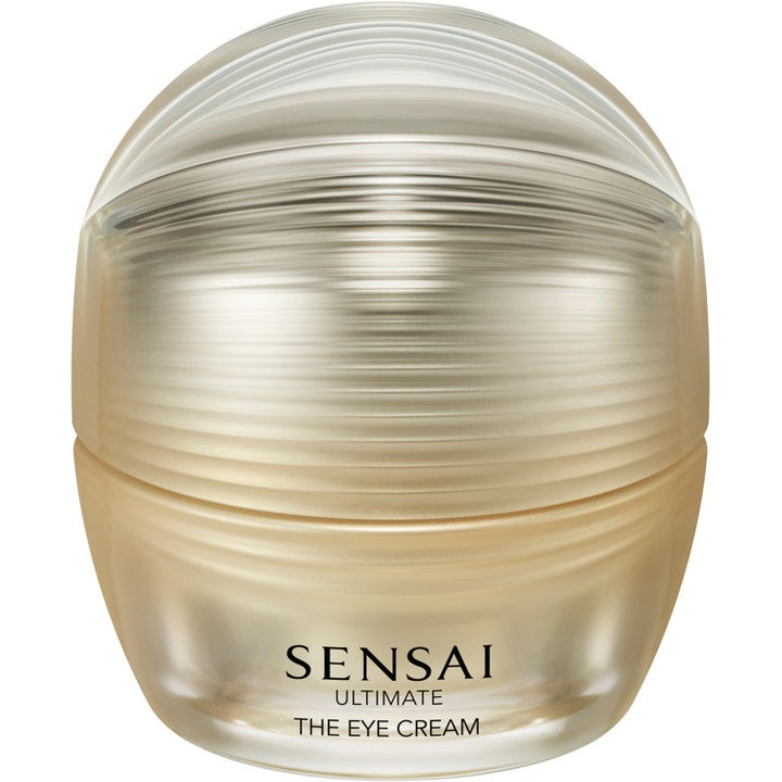 Sensai Ultimate The Eye Cream 15ml foryngende øyekrem i luksuriøs gullfarget krukke med rillet tekstur og klart lokk