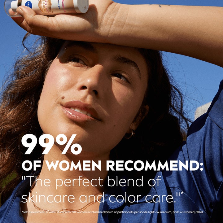 NIVEA Luminous 630 Anti Dark-Spot CC Fluid 40 ml mot pigmentflekker vist på kvinne i klart sollys.