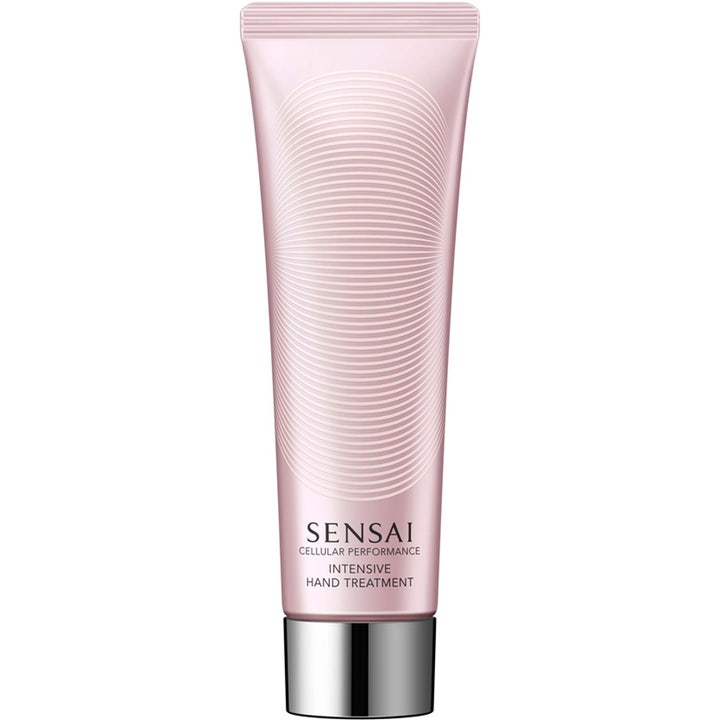 Sensai Cellular Performance Intensive Hand Treatment håndkrem i en lyserosa tube med sirkelmønster og sølvkork.
