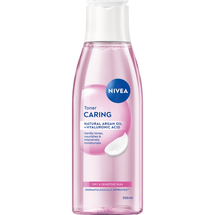 Nivea Caring Toner 200 ml fuktighetsgivende ansiktsvann med arganolje i gjennomsiktig flaske med rosa væske
