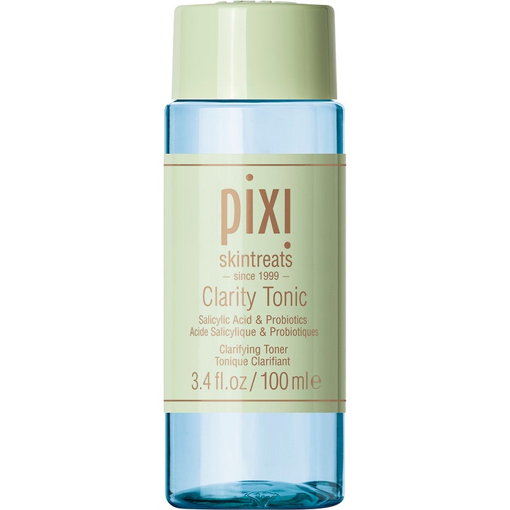 Pixi Clarity Tonic 100 ml rensende ansiktsvann med salisylsyre i en lyseblå flaske med lysegrønn etikett og kork.