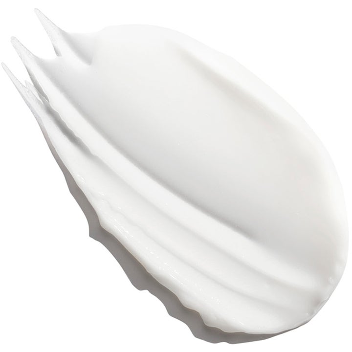 Exuviance Age Reverse + Rebuild-5 Cream 50 ml oppstrammende dagkrem med en hvit og fyldig kremet tekstur