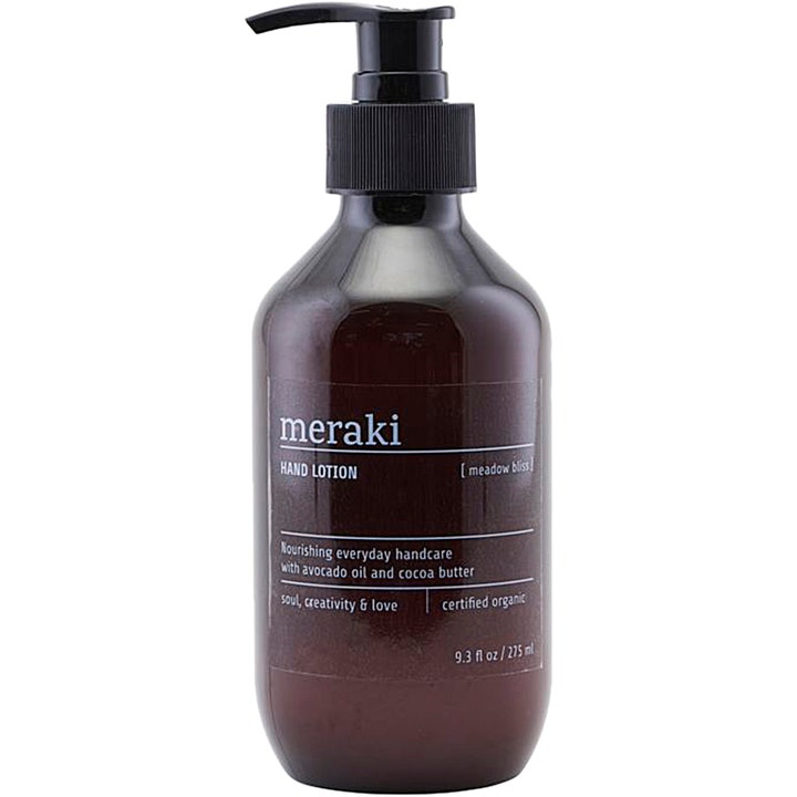 Meraki Meadow Bliss Hand Lotion 275 ml pleiende håndkrem med avokadoolje i en mørk brun flaske med svart pumpe.