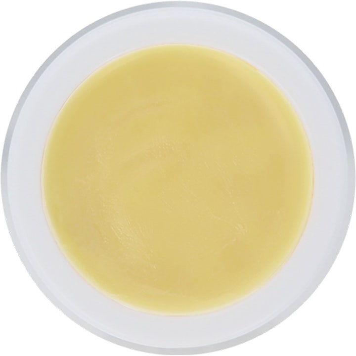 Maria Åkerberg Baby Care 10 ml beskyttende barnekrem viser en glatt gul salve i en hvit krukke sett ovenfra