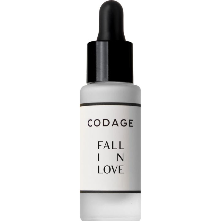 Codage Fall In Love ansiktsserum som gir fuktighet i en frostet glassflaske med svart pipette og hvit etikett