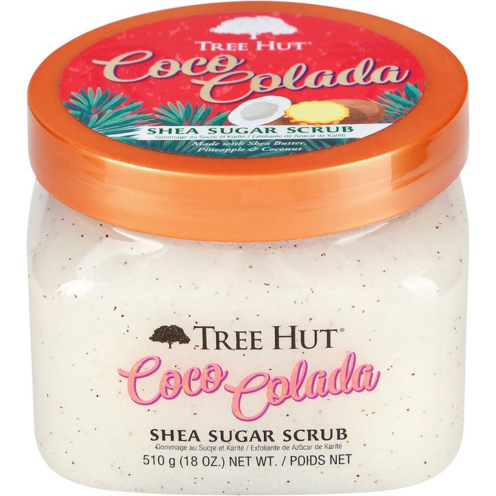 Tree Hut Coco Colada Shea Sugar Scrub 510 g eksfolierende kroppsskrubb i krukke med kobberfarget lokk og hvit tekstur