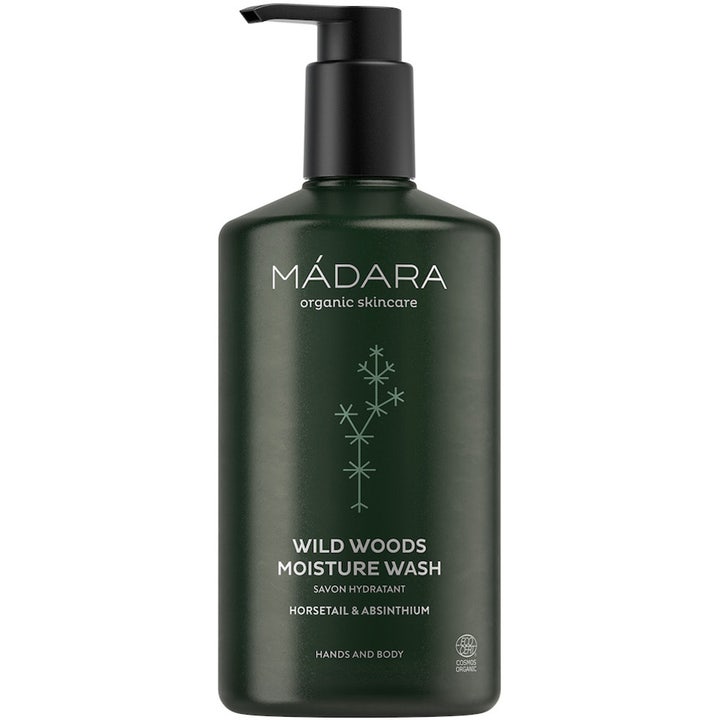 Mádara Wild Woods Moisture Wash fuktgivende kroppssåpe i mørkegrønn flaske med svart pumpe og plantemotiv.