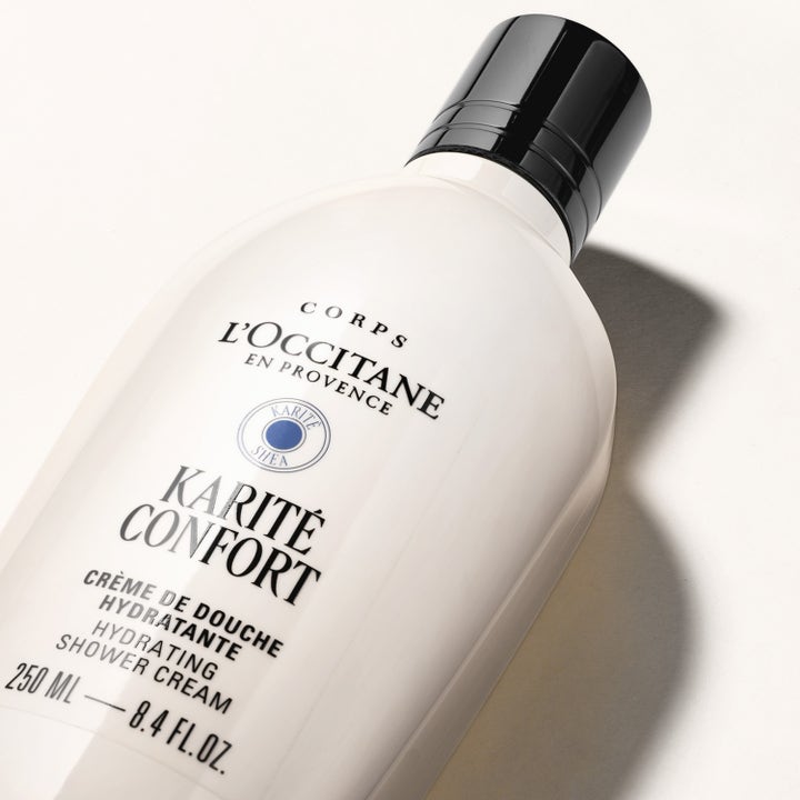 L'Occitane en Provence Shea Butter Body Shower Cream 250 ml fuktighetsgivende dusjkrem i hvit flaske med sort kork