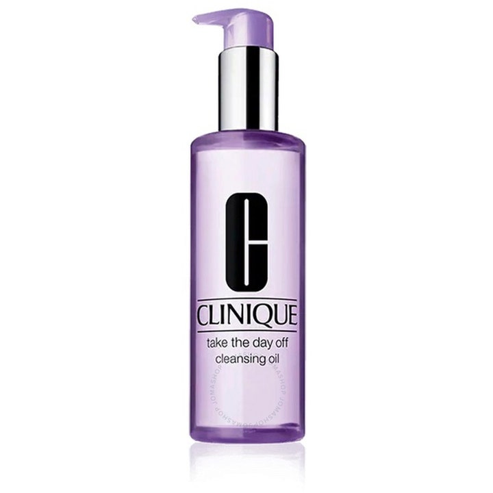 Clinique Take The Day Off Cleansing Oil 200 ml renseolje som fjerner sminke i lilla gjennomsiktig flaske med sølvpumpe