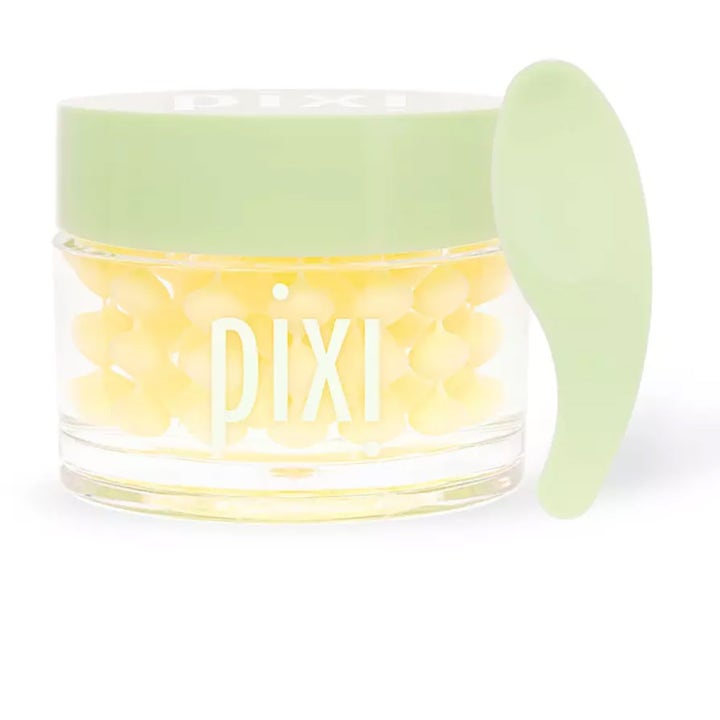 Pixi DetoxifEYE 60 stk oppfriskende ansiktspleie i krukke med gule øyelapper og en lysegrønn spatel