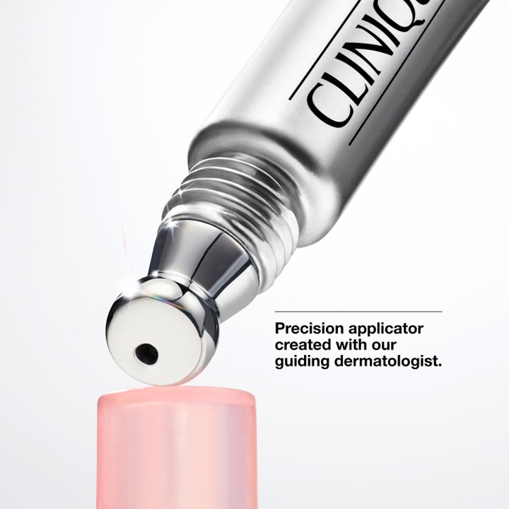 Clinique All About Eyes Brightening Serum Concentrate 10 ml øyeserum med sølvfarget presisjonsapplikator som lysner