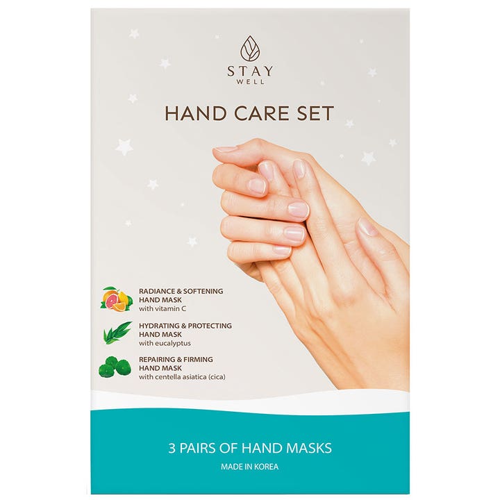 Stay Well Hand Care Set 3 par pleiende håndmasker som gir fuktighet og glød i hvit eske med bilde av hender