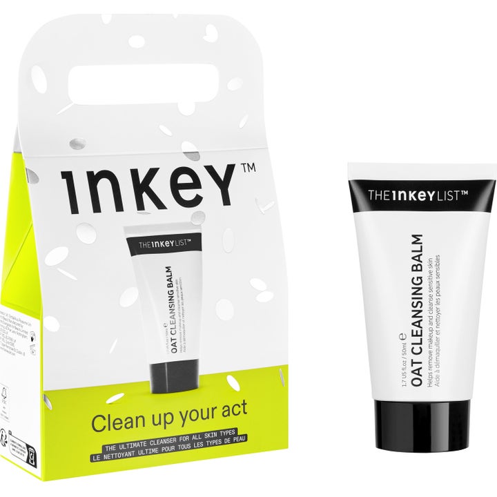 The INKEY List Oat Cleansing Balm 50 ml beroligende ansiktsrens i hvit tube ved siden av hvit og gul eske