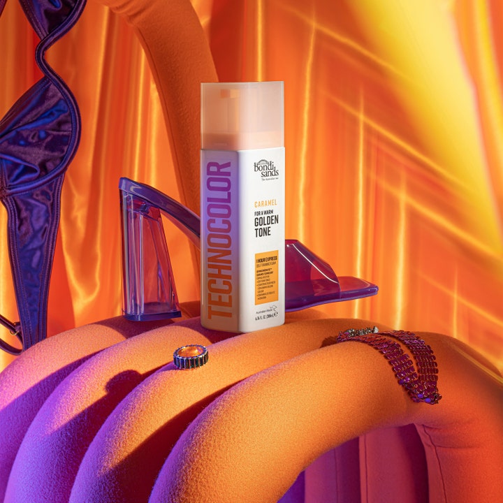 Bondi Sands Technocolor Face Serum Caramel 50 ml selvbruning for ansiktet som gir glød i varmt lys og lilla omgivelser