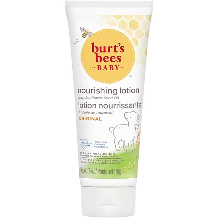 Burt's Bees Baby Nourishing Lotion 170g fuktighetskrem med solsikkeolje i hvit tube dekorert med en gul logo og et lam.