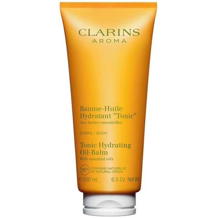Clarins Tonic Hydrating Oil-Balm 200 ml fuktighetsgivende kroppsbalm i en frisk oransje tube med hvitt lokk
