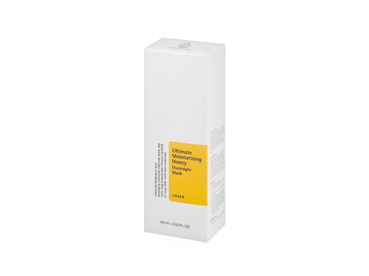COSRX Ultimate Moisturizing Honey Overnight Mask 60 ml fuktighetsgivende nattmask i hvit eske med gul detalj.