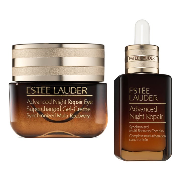 Estée Lauder Advanced Night Repair reparerende øyekrem og serum i brune glassbeholdere med luksuriøse gulldetaljer.