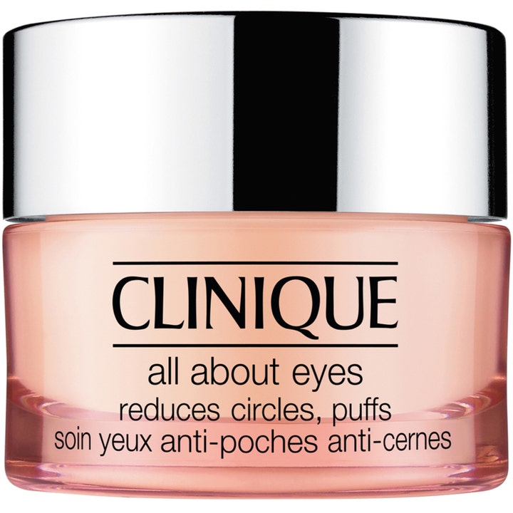 Clinique All About Eyes 15 ml øyekrem som reduserer poser under øynene i en ferskenfarget glasskrukke med sølvlokk