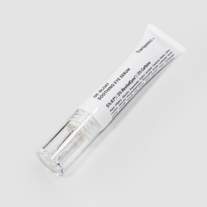 Niche Beauty Lab Transparent Lab De-Bloat Soothing Eye Serum 15 ml beroligende øyeserum i hvit tube med klar kork